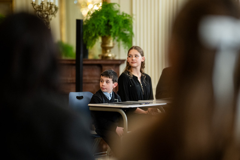 Young students participate in the Education Executive Order signing