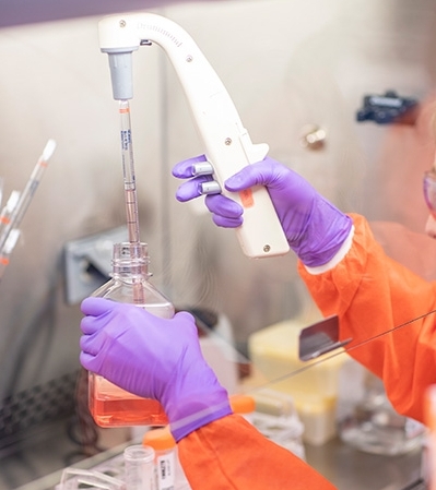 Laboratory technician performing beryllium lymphocyte proliferation test