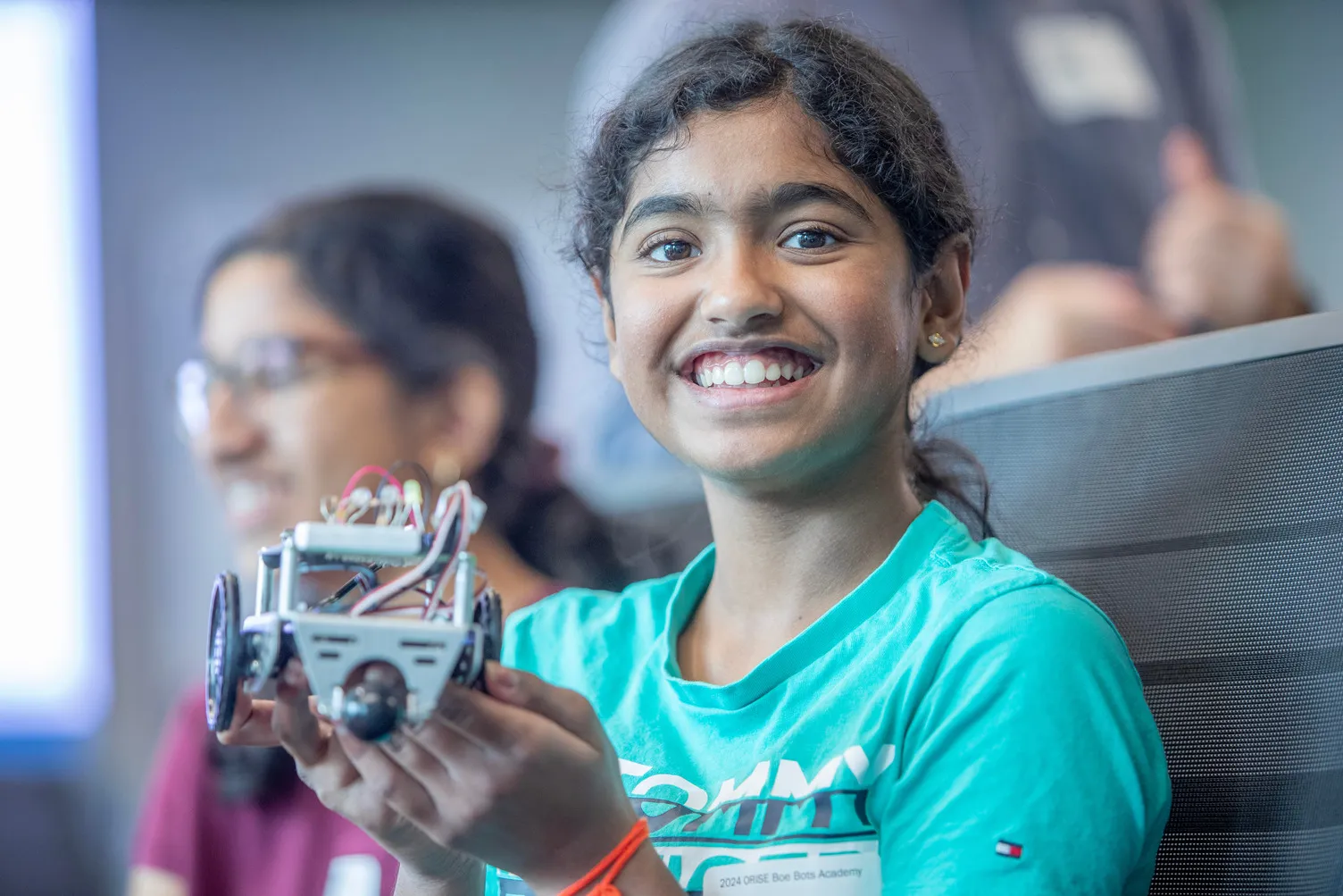 A group of K-12 students build a robot