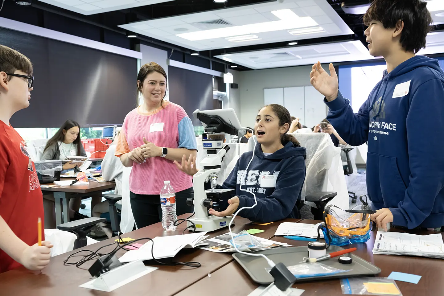 Middle school students engaged in STEM learning activity