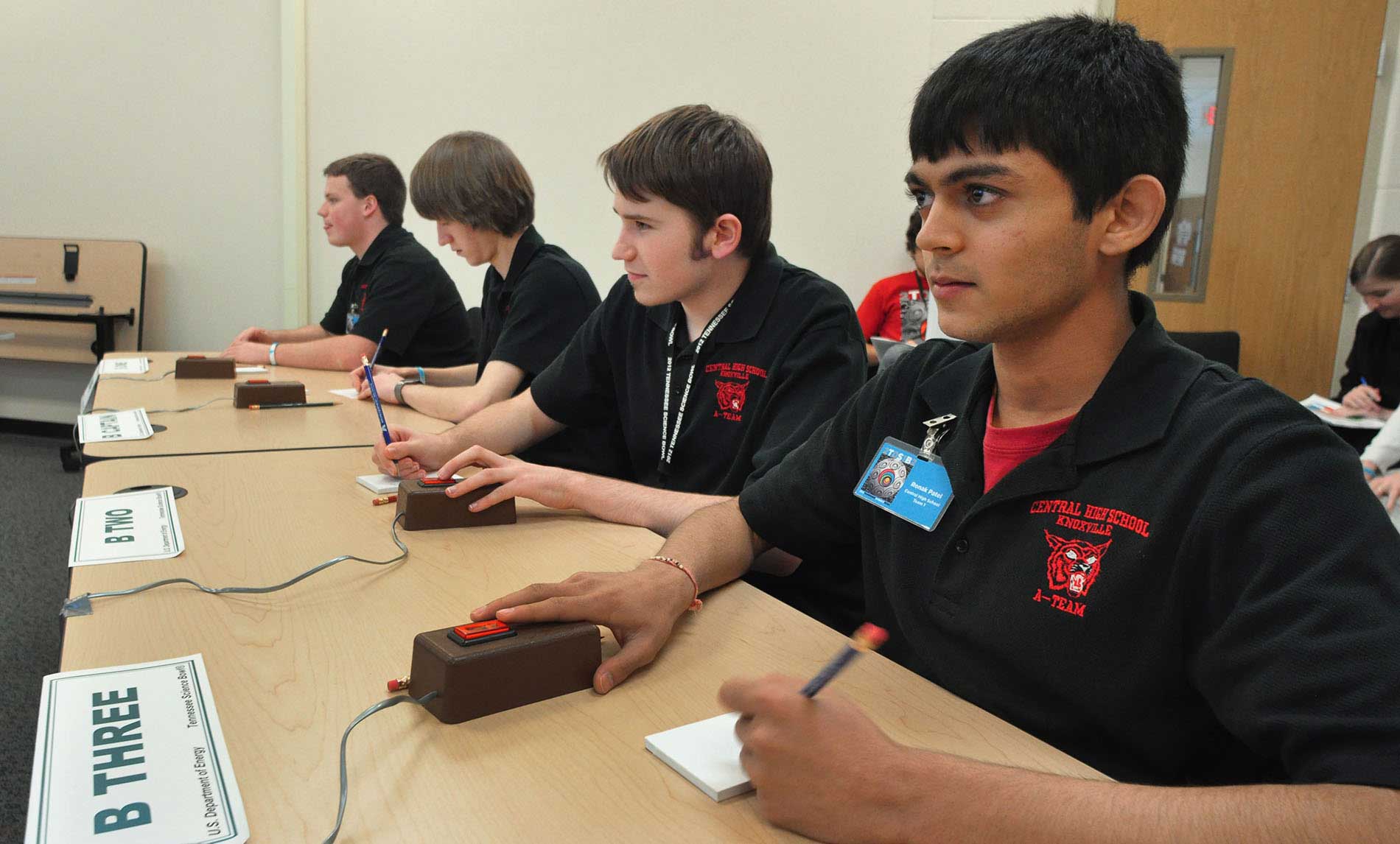 Tennessee Science Bowl teammates prepare to answer a question