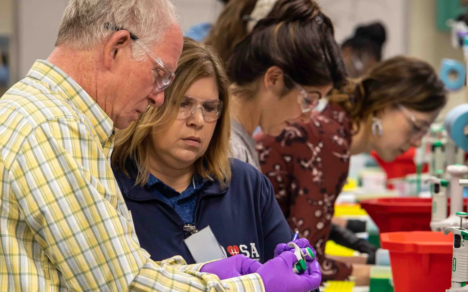 Group of K-12 STEM teachers engaged in professional development activity