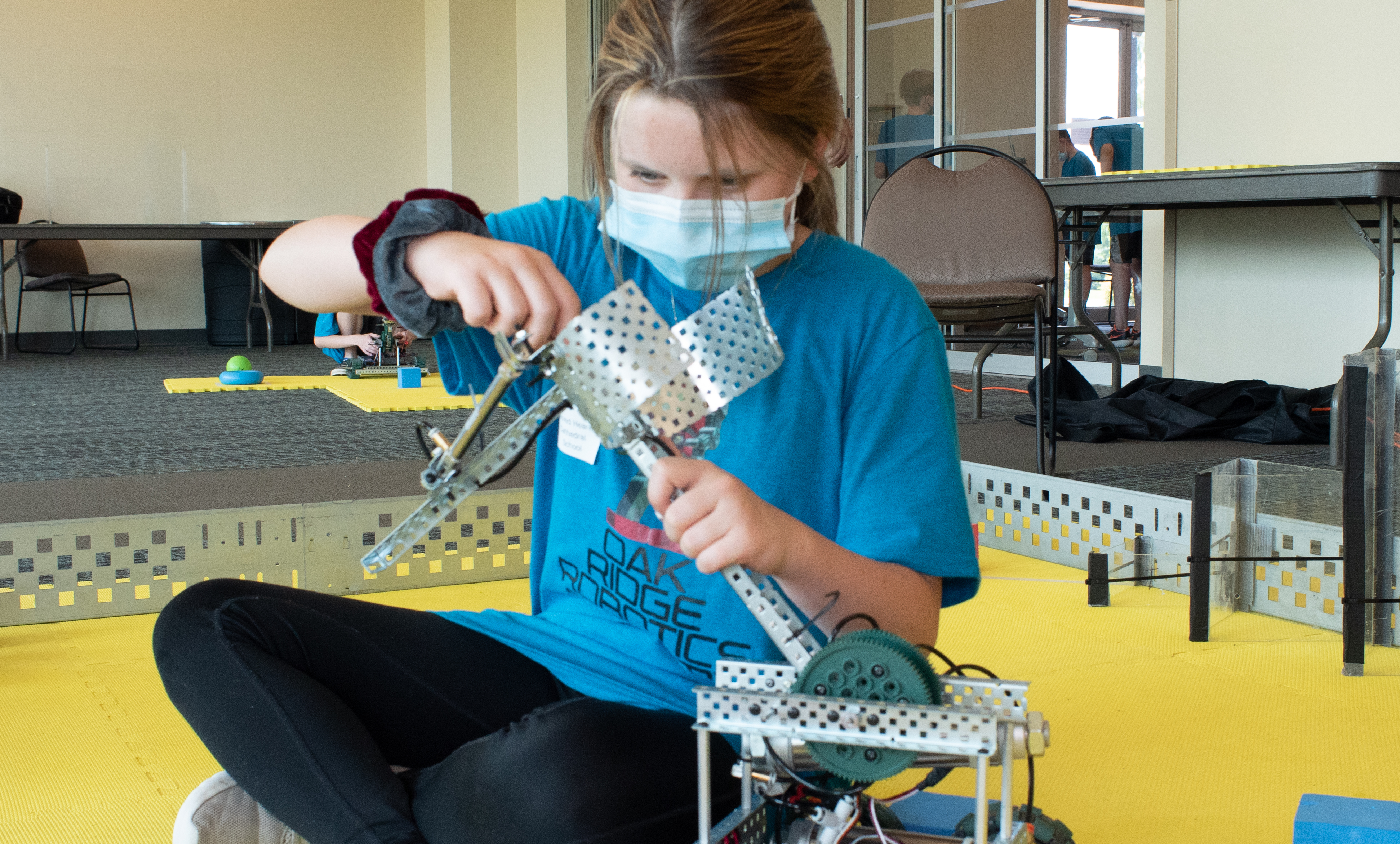 A female student participates in the Oak Ridge Robotics Academy