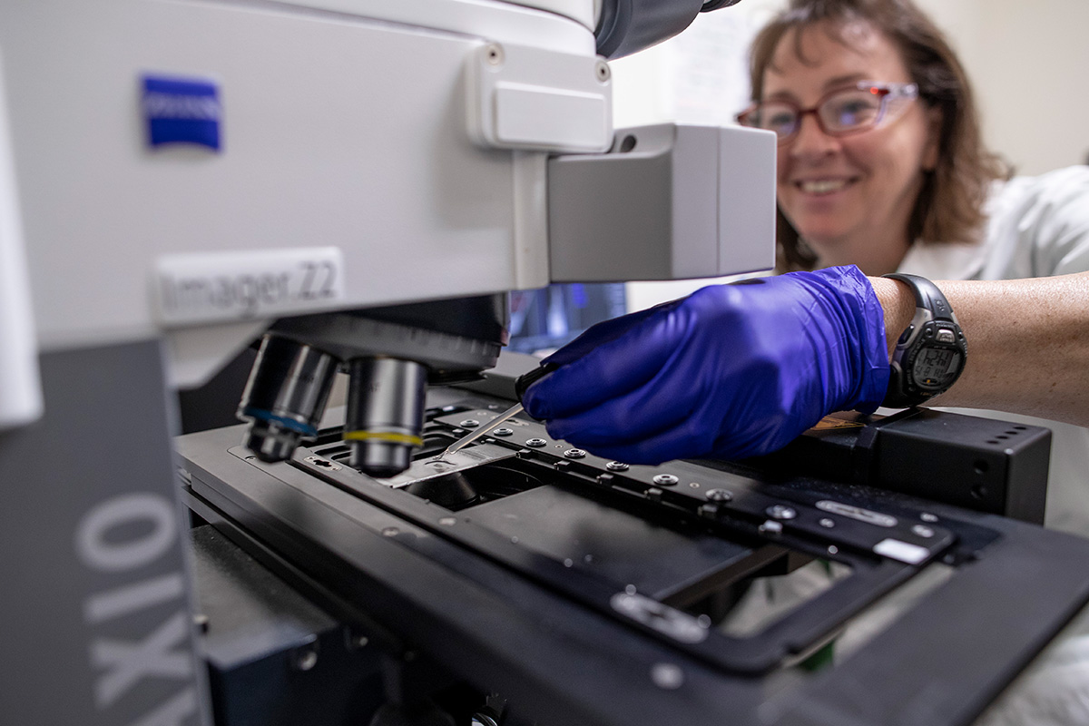 Cytogenetic Biodosimetry Laboratory technician prepares a sample for testing 