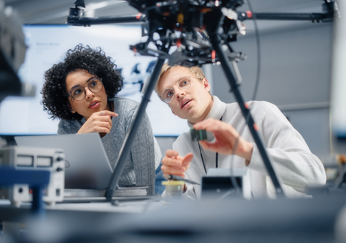 Colleagues building, configuring and testing machines