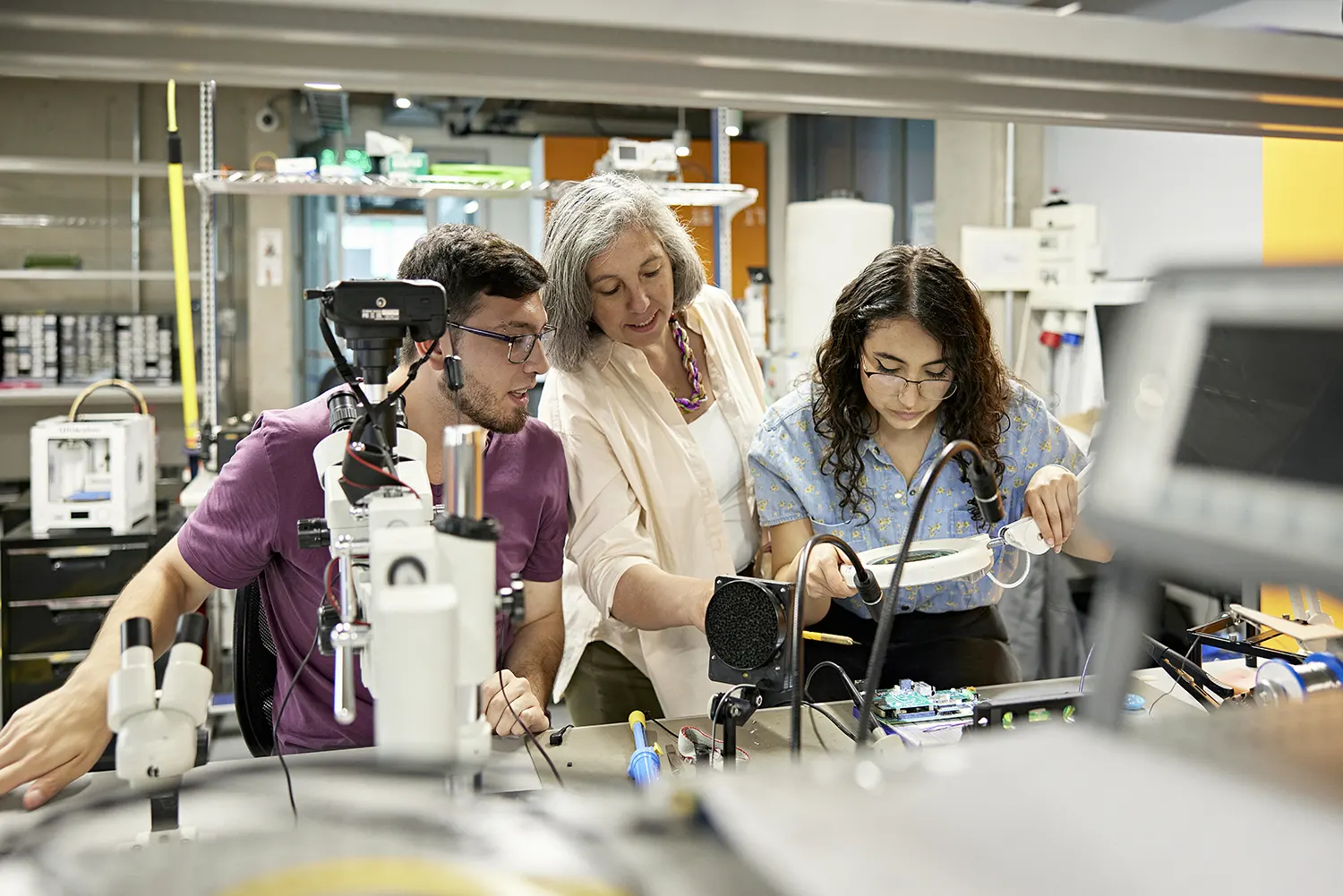 College instructor and electrical engineering students