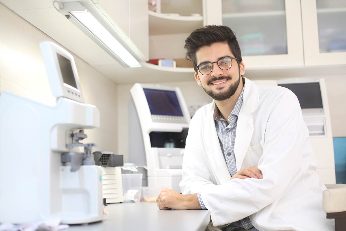 A postdoctoral researcher in a laboratory setting