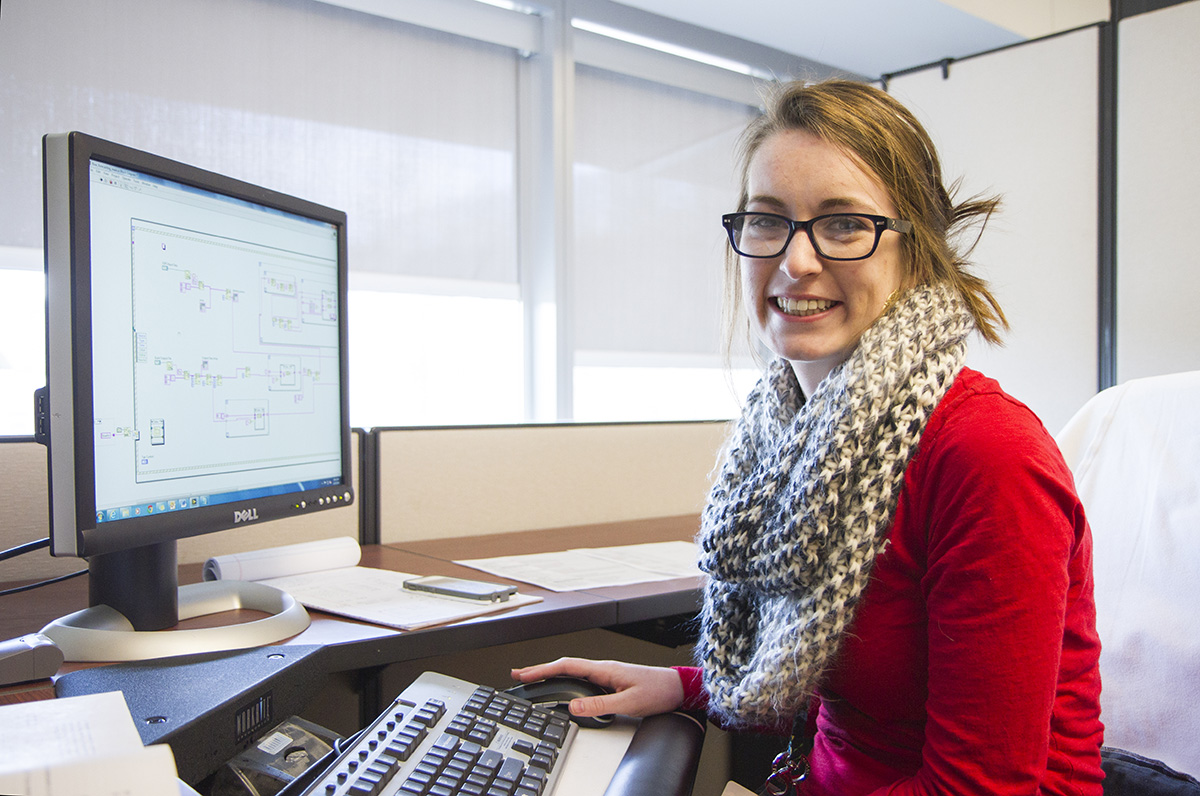 An undergraduate female conducts research during an internship at Oak Ridge National Laboratory