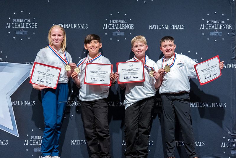 A student participates in AI Challenge finals activities