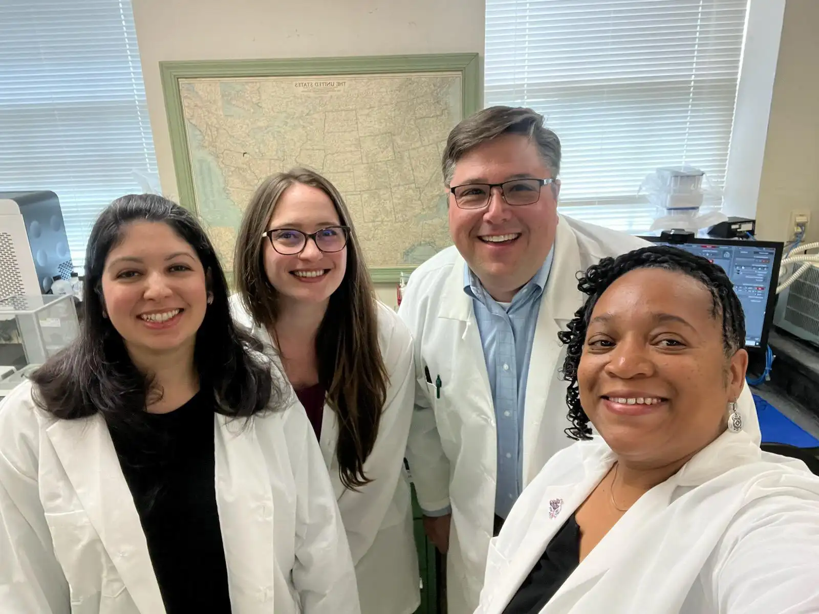 Holly Bartholomew with her research team. From left to right: Dianiris Luciano-Rosario, Ph.D., Holly Bartholomew, Ph.D., Wayne M. Jurick II, Ph.D., Verneta L. Gaskins. (Photo Credit: Verneta L. Gaskins)